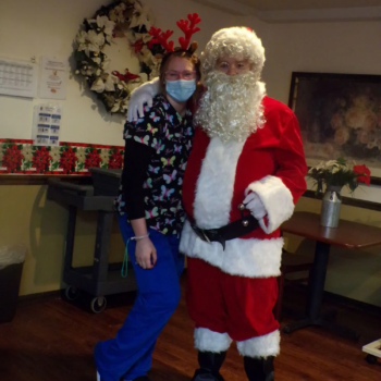 Healthcare worker and Santa Claus